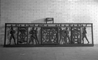 Unknown (American). <em>Railing (One of Seven Sections) from the Police Gazette Building, 338-344 Pearl Street, NYC</em>, 1883-1895. Cast iron, overall: 37 1/2 x 831 x 2 1/2 in. (95.3 x 2110.7 x 6.4 cm). Brooklyn Museum, Gift of the William and Marian Zeckendorf Foundation, Inc., 66.249.2. Creative Commons-BY (Photo: , 66.249.1_66.249.2_66.249.3_66.249.4_acetate_bw.jpg)