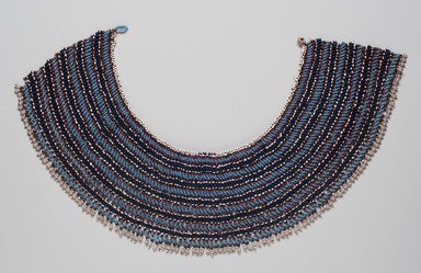 Xhosa (Thembu subgroup). <em>Collar (Ingqosha)</em>, early 20th century. Glass seed beads, sinew, Lower curve length: 27 x 5 in. (68.6 x 12.7 cm). Brooklyn Museum, Gift of Mr. and Mrs. Jerome Blum, 66.86.14. Creative Commons-BY (Photo: Brooklyn Museum, 66.86.14_PS11.jpg)