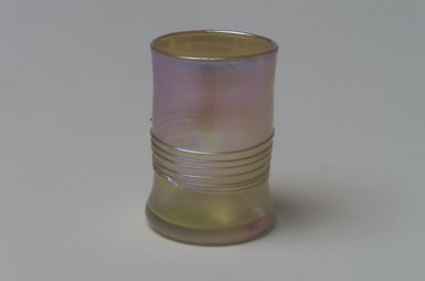 Tiffany Studios (1902-1932). <em>Shot Glass</em>, ca. 1896-1900. Opalescent glass, 1 1/2 x 1 1/8 x 1 1/8 in. (3.8 x 2.9 x 2.9 cm). Brooklyn Museum, Bequest of Laura L. Barnes, 67.120.106. Creative Commons-BY (Photo: Brooklyn Museum, 67.120.106.jpg)