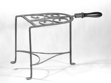  <em>Trivet</em>, ca. 1780. Wrought iron, 9 1/4 x 7 x 16 in. (23.5 x 17.8 x 40.6 cm). Brooklyn Museum, Gift of Mr. and Mrs. Henry Sherman, 67.128.27. Creative Commons-BY (Photo: Brooklyn Museum, 67.128.27_bw.jpg)