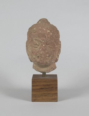  <em>Head of Buddha</em>, 2nd century. Sandstone, 4 x 2 1/2 in. (10.2 x 6.4 cm). Brooklyn Museum, Gift of Paul E. Manheim, 67.199.37. Creative Commons-BY (Photo: Brooklyn Museum, 67.199.37_PS5.jpg)
