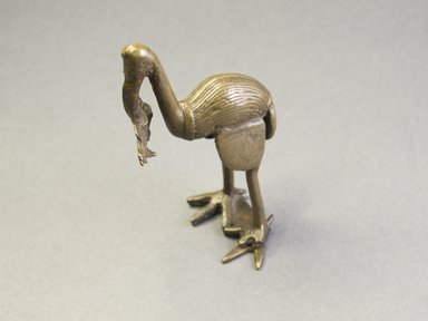 Akan. <em>Gold-weight (abrammuo): bird</em>., 3 1/4 x 1 9/16 x 2 1/8 in. (8.2 x 4 x 5.4 cm). Brooklyn Museum, Bequest of Laura L. Barnes, 67.25.25. Creative Commons-BY (Photo: Brooklyn Museum, 67.25.25_side_PS5.jpg)