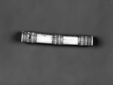 Canadian Inuit. <em>Hollow Billet for game or Needle Case</em>, 1801-1967. Ivory or bone, 3 1/2 x 1/2in. (8.9 x 1.3cm). Brooklyn Museum, Gift of J.L. Greason, 67.26.12. Creative Commons-BY (Photo: Brooklyn Museum, 67.26.12_bw.jpg)