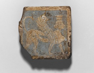 <em>Tile with Winged Crowned Female Sphinx</em>, 3rd century B.C.E. Faience, 2 3/8 × 2 3/8 × 5/8 in. (6.1 × 6.1 × 1.6 cm). Brooklyn Museum, Charles Edwin Wilbour Fund, 68.19. Creative Commons-BY (Photo: Brooklyn Museum, 68.19_PS1.jpg)