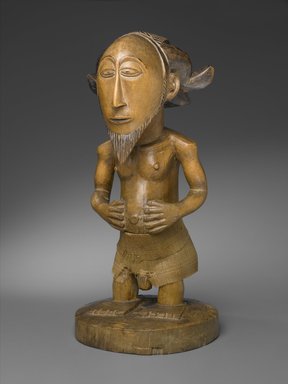 Hemba. <em>Standing Male Figure (Sigiti)</em>, late 19th century. Carved, stained lightwood, incised, polished, woven reed, 17 3/4 x 8 x 8 in. (45.1 x 20.3 x 20.3 cm). Brooklyn Museum, Gift of the Florence and Carl L. Selden Foundation, 68.32. Creative Commons-BY (Photo: Brooklyn Museum, 68.32_PS2.jpg)