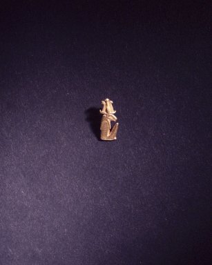  <em>Pendant of Ram-Headed Deity</em>, ca. 1292-1075 B.C.E. Gold, 3/4 x 5/16 x 1/4 in. (1.9 x 0.8 x 0.6 cm). Brooklyn Museum, Charles Edwin Wilbour Fund, 68.83.2. Creative Commons-BY (Photo: Brooklyn Museum, 68.83.2_transp5436c003.jpg)