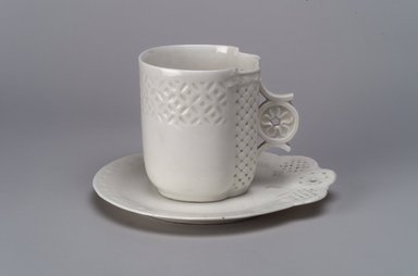 Union Porcelain Works (1863–ca. 1922). <em>Cup and Saucer</em>, ca. 1876. Porcelain, (a) Cup: 3 1/16 x 3 5/8 x 3 1/16 in. (7.8 x 9.2 x 7.8 cm). Brooklyn Museum, Gift of Franklin Chace, 68.87.50a-b. Creative Commons-BY (Photo: Brooklyn Museum, 68.87.50a-b.jpg)