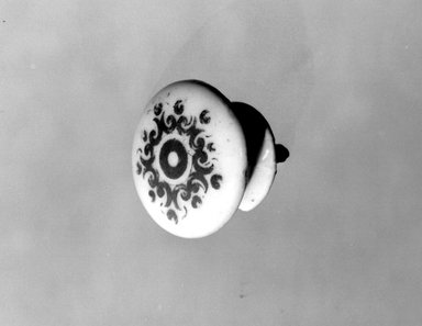 Union Porcelain Works (1863-ca. 1922). <em>Door Knob for a Cupboard</em>, late 19th century. Porcelain, 5/8 x 1 1/4 x 1 1/4 in. (1.6 x 3.2 x 3.2 cm). Brooklyn Museum, Gift of Franklin Chace, 68.87.64. Creative Commons-BY (Photo: Brooklyn Museum, 68.87.64_bw.jpg)