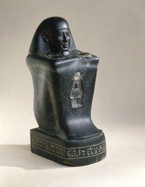  <em>Block Statue of a High Official</em>, 305–30 B.C.E. Diorite, 15 3/8 x 6 9/16 x 7 7/8 in., 42.5 lb. (39 x 16.7 x 20 cm, 19.28kg). Brooklyn Museum, Charles Edwin Wilbour Fund, 69.115.1. Creative Commons-BY (Photo: Brooklyn Museum, 69.115.1_SL1.jpg)