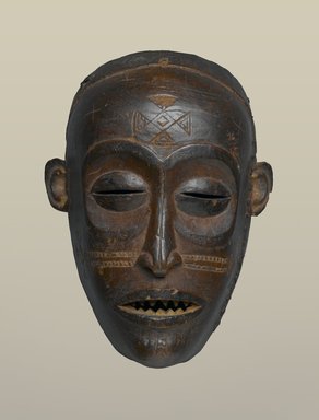 Chokwe. <em>Mask (Mwana Pwo)</em>, 19th century. Wood, 7 1/2 x 3 1/8 x 5 1/2 in. (19.1 x 8 x 14 cm). Brooklyn Museum, Gift of Mr. and Mrs. John McDonald, 69.168.2. Creative Commons-BY (Photo: Brooklyn Museum, 69.168.2_PS2.jpg)