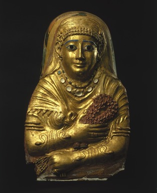  <em>Mummy Cartonnage of a Woman</em>, 1st century C.E. Linen, gesso, gold leaf, glass, faience, 23 x 14 x 9 in. (58.4 x 35.6 x 22.9 cm). Brooklyn Museum, Charles Edwin Wilbour Fund, 69.35. Creative Commons-BY (Photo: Brooklyn Museum, 69.35_SL1.jpg)