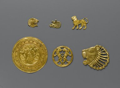 Achaemenid. <em>Dress Ornament</em>, 6th–5th century B.C.E. Gold, 1 13/16 × 2 5/16 in. (4.6 × 5.8 cm). Brooklyn Museum, Gift of Mr. and Mrs. Alastair Bradley Martin, 70.142.11. Creative Commons-BY (Photo: , 70.142.6-.11_PS2.jpg)