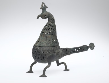  <em>Incense Burner in Shape of a Peacock</em>, 12th-13th century. Copper alloy, pierced and engraved, 10 1/2 x 11 1/2 in. (26.7 x 29.2 cm). Brooklyn Museum, Special Middle Eastern Art Fund, 70.98.1. Creative Commons-BY (Photo: Brooklyn Museum, 70.98.1_threequarter_PS2.jpg)