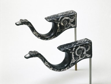 
                         Pair of Crossbow Mounts, 770-256 B.C.E. Bronze, inlaid with silver, 7 3/4 x 3 1/4 in. (19.7 x 8.3 cm). Brooklyn Museum, Gift of Mr. and Mrs. Alastair B. Martin, the Guennol Collection, 71.118.1a-b. Creative Commons-BY (Photo: Brooklyn Museum, 71.118.1a-b_SL1.jpg)                      