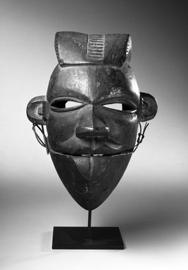 Ogoni. <em>Elu Mask with Hinged Jaw</em>, early 20th century. Wood, fiber, 7 7/8 x 5 7/8 x 4 3/4 in. (20 x 15 x 12 cm). Brooklyn Museum, Gift of Dr. and Mrs. Milton Gross, 71.126. Creative Commons-BY (Photo: Brooklyn Museum, 71.126_bw.jpg)