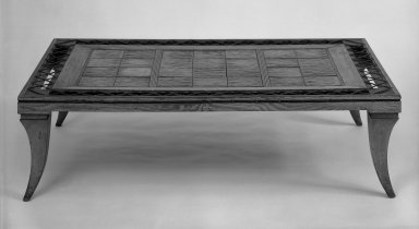 American. <em>Coffee Table</em>, ca. 1939. Wood, glazed earthenware, leather, 11 3/8 x 41 1/2 x 25 3/8 in. (28.9 x 105.4 x 64.5 cm). Brooklyn Museum, Gift of Hollis K. Thayer, 71.96. Creative Commons-BY (Photo: Brooklyn Museum, 71.96_cropped_bw_IMLS.jpg)