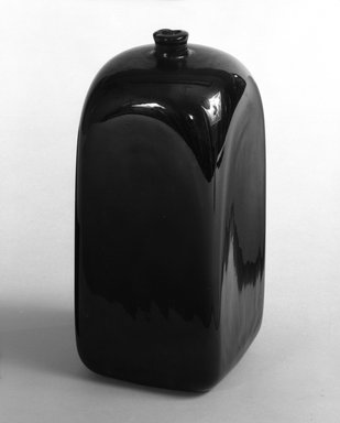 Maestri Vetrai Muranesi-Cappellin e Co. (Murano, Italy, 1925-1931). <em>One of Two Square Bottles in Art Deco Style</em>, ca. 1930. Iridescent glass, H: 6 in. (15.2 cm). Brooklyn Museum, Gift of Eliane Vinci Leoni-Corradini, 72.126.1. Creative Commons-BY (Photo: Brooklyn Museum, 72.126.1_bw.jpg)