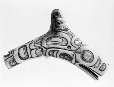 Tlingit. <em>Shaman's Charm or Soul Catcher</em>, late 19th or early 20th century. Bone or Ivory, abalone shell, 9 1/2 x 6 x 1 1/4 in.  (24.1 x 15.2 x 3.2 cm). Brooklyn Museum, By exchange, 73.110. Creative Commons-BY (Photo: Brooklyn Museum, 73.110_bw.jpg)
