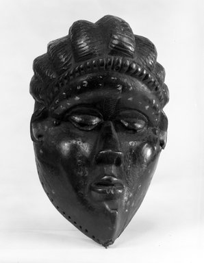  <em>Mask</em>, late 19th-early 20th century. Wood, applied materials,pigment, ferrous nails, 8 1/16 x 4 1/2 in. (20.5 x 11.4 cm). Brooklyn Museum, Gift of Dr. and Mrs. Abbott A. Lippman, 73.154.1. Creative Commons-BY (Photo: Brooklyn Museum, 73.154.1_bw.jpg)