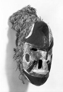 Nupe. <em>Mask with Basketry Rim (Bekee)</em>, early 20th century. Wood, raffia, pigment, 7 1/2 x 5 x 7 in. (19.0 x 12.8 x 17.8 cm). Brooklyn Museum, Gift of Gaston T. de Havenon, 73.179.12. Creative Commons-BY (Photo: Brooklyn Museum, 73.179.12_bw.jpg)