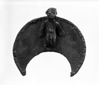 Nuna. <em>Crescent-shaped Form with Animal Set in Center</em>, late 19th-early 20th century. Bronze, 3 1/2 x 3 3/8 in. (8.9 x 8.6 cm). Brooklyn Museum, Gift of Ruth R. Gross, 73.180.1. Creative Commons-BY (Photo: Brooklyn Museum, 73.180.1_bw.jpg)
