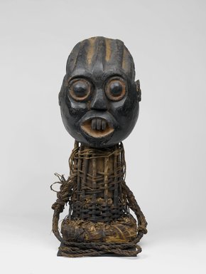 Bamum. <em>Funerary Headdress (Tugunga)</em>, late 19th century. Wood, rattan, pigment, 33 x 14 3/16 x 14 3/16 in. (83.8 x 36 x 36 cm). Brooklyn Museum, Gift of Mrs. Melville W. Hall, 73.36. Creative Commons-BY (Photo: Brooklyn Museum, 73.36_front_PS1.jpg)