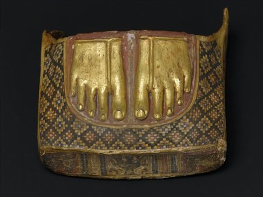  <em>Footcase of a Mummy with Images of Defeated Enemies Under the Feet</em>, ca. 1st century C.E. Plaster, pigment, gold leaf, 9 13/16 x 10 3/16 x 5 1/2 in. (25 x 25.8 x 13.9 cm). Brooklyn Museum, Charles Edwin Wilbour Fund, 73.89. Creative Commons-BY (Photo: Brooklyn Museum, 73.89_top_PS2.jpg)