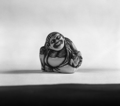  <em>Netsuke Depicting Gama Senin Looking at a Frog on his Lap</em>, 19th century. Ivory, 1 3/8in. (3.5cm). Brooklyn Museum, Gift of Mr. and Mrs. Burton Krouner, 74.103.4. Creative Commons-BY (Photo: Brooklyn Museum, 74.103.4_bw.jpg)