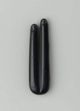  <em>Two Fingers Amulet</em>, 332-30 B.C.E. Obsidian, 3/8 x 7/8 x 3 1/4 in. (1 x 2.2 x 8.3 cm). Brooklyn Museum, Charles Edwin Wilbour Fund, 74.158. Creative Commons-BY (Photo: Brooklyn Museum, 74.158_front_PS2.jpg)