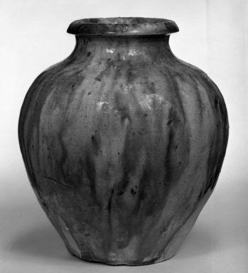  <em>Jar</em>, 618-907. Earthenware with four-color lead glaze, H: 4 15/16 in. (12.5 cm). Brooklyn Museum, Gift of Bernice and Robert Dickes, 74.159.1. Creative Commons-BY (Photo: Brooklyn Museum, 74.159.1_bw.jpg)