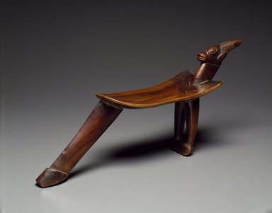 Sikire Kambire (Lobi, 1896-1963). <em>Three Legged Stool</em>, late 19th-early 20th century. Wood, 11 x 6 x 23 7/8 in. (28.0 x 60.5 x 15.0 cm). Brooklyn Museum, Purchased with funds given by David Shaw King and Carll H. de Silver Fund, 74.175. Creative Commons-BY (Photo: Brooklyn Museum, 74.175_SL3.jpg)