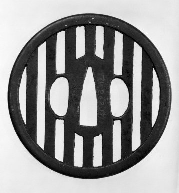 <em>Tsuba (Sword Guard)</em>, 17th–18th century. Black-patinated iron

Iron; traces of gold, 3 3/8 in. (8.5 cm). Brooklyn Museum, Gift of Leighton R. Longhi, 74.202.12. Creative Commons-BY (Photo: Brooklyn Museum, 74.202.12_side1_bw.jpg)