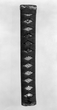  <em>Tsuka (Sword Handle)</em>, 18th century. Wood, ray skin, dark blue silk cord, handle: 1 9/16 x 9 1/16 in. (4 x 23 cm). Brooklyn Museum, Gift of Leighton R. Longhi, 74.202.4. Creative Commons-BY (Photo: Brooklyn Museum, 74.202.4_bw.jpg)