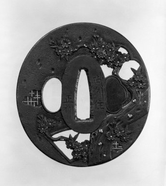  <em>Tsuba (Sword Guard)</em>, ca. 1800. Iron, gilding; shakudo caps, 2 15/16 x 2 3/4 in. (7.4 x 7 cm). Brooklyn Museum, Gift of Leighton R. Longhi, 74.202.9. Creative Commons-BY (Photo: Brooklyn Museum, 74.202.9_side1_bw.jpg)