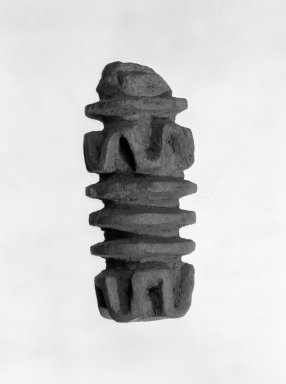  <em>Ban Chieng Pottery Roulette</em>, 5th-4th century B.C.E. Reddish-buff earthenware, 2 7/16 x 7/8 in. (6.2 x 2.3 cm). Brooklyn Museum, Gift of Roberta Pincus, 74.204. Creative Commons-BY (Photo: Brooklyn Museum, 74.204_bw.jpg)