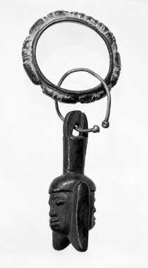 Yorùbá. <em>Janus-Headed Shango Figure</em>, late 19th or early 20th century. Wood, patina, 5 1/2 x 2 1/4 x diam: 2 in. Brooklyn Museum, Gift of Ruth R. Gross, 74.213.1c. Creative Commons-BY (Photo: , 74.213.1a_74.213.1b_74.213.1c_view2_bw.jpg)
