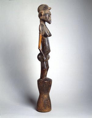 Senufo. <em>Rhythm Pounder (Siibele)</em>, late 19th or early 20th century. Wood, 40 1/2 x 6 x 6 1/2 in. (102.9 x 15.2 x 16.5 cm). Brooklyn Museum, Gift of Rosemary and George Lois, 74.214. Creative Commons-BY (Photo: Brooklyn Museum, 74.214_view2_SL4.jpg)