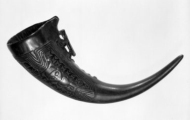 Tikar. <em>Drinking Horn</em>, late 19th or early 20th century. Buffalo horn, accumulated materials, 12 3/8 x 8 x 2 3/4 in. (31.4 x 20.3 x 7.0 cm). Brooklyn Museum, Gift of Dr. and Mrs. Willi Riese to the Jennie Simpson Educational Collection of African Art, 74.217.3. Creative Commons-BY (Photo: Brooklyn Museum, 74.217.3_bw.jpg)