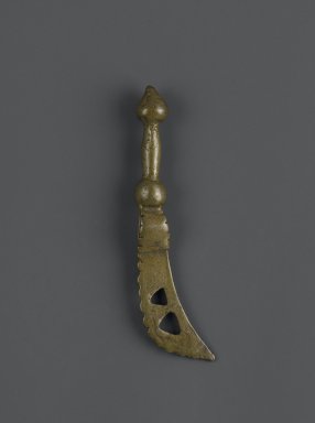 Asante. <em>Gold-weight (abrammuo): sword</em>, 19th or 20th century. Cast brass, 3/4 x 2 15/16 in. (1.9 x 7.5 cm). Brooklyn Museum, The Franklin H. Williams Collection of Ashanti Brass Weights and Accessory Objects for Weighing Gold, Gift of Mr. and Mrs. Franklin H. Williams, 74.218.24. Creative Commons-BY (Photo: Brooklyn Museum, 74.218.24_PS6.jpg)