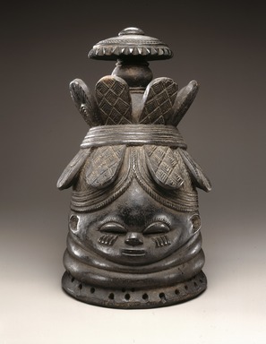 Mende. <em>Sande society mask (sowei)</em>, late 19th-early 20th century. Wood, pigment, metal, 15 1/2 x 9 1/4 x 10 1/4 in. (39.4 x 23.5 x 26 cm). Brooklyn Museum, Carll H. de Silver Fund, 74.64. Creative Commons-BY (Photo: Brooklyn Museum, 74.64_edited_SL1.jpg)