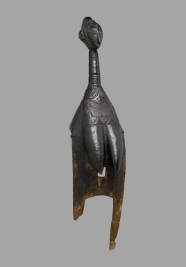 Possibly Baga. <em>Headdress (Zigiren-Wɔndɛ)</em>, late 19th–early 20th century. Wood, upholstery stud, 33 x 7 3/4 x 9 in. (83.8 x 19.7 x 22.9 cm). Brooklyn Museum, Gift of Marcia and John Friede, 74.66.5. Creative Commons-BY (Photo: Brooklyn Museum, 74.66.5_PS1.jpg)