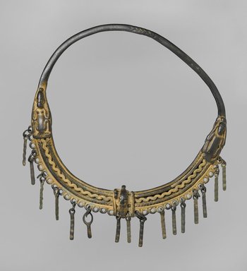 Dogon. <em>Necklace</em>, 11th–15th century (?). Copper alloy, 9 x 9 x 1 in. (22.9 x 22.9 x 2.5 cm). Brooklyn Museum, Gift of Mrs. Jacob M. Kaplan, 74.67. Creative Commons-BY (Photo: Brooklyn Museum, 74.67_PS2.jpg)