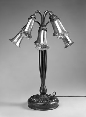 Tiffany Studios (1902-1932). <em>Lamp</em>, ca. 1910. Bronze, opalescent glass, 21 7/8 × 15 × 15 in. (55.6 × 38.1 × 38.1 cm). Brooklyn Museum, Gift of John H. Livingston, 74.96.2a-i. Creative Commons-BY (Photo: Brooklyn Museum, 74.96.2a-i_bw.jpg)