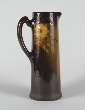 J.B. Owens. <em>Pitcher</em>, 1896-1907 / 08. Earthenware with underglaze decoration, 12 1/16 x 4 7/8 in. (30.7 x 12.4 cm). Brooklyn Museum, Gift of John H. Livingston, 74.96.5. Creative Commons-BY (Photo: Brooklyn Museum, 74.96.5_PS5.jpg)