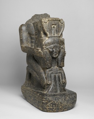  <em>Kaemwaset Kneeling with an Emblem of Hathor</em>, ca. 1400–1390 B.C.E. Granite, pigment, 26 1/8 x 10 1/4 x 17 13/16in. (66.3 x 26 x 45.3cm). Brooklyn Museum, Gift of Christos G. Bastis, 74.97. Creative Commons-BY (Photo: Brooklyn Museum, 74.97_threequarter_right_PS1.jpg)