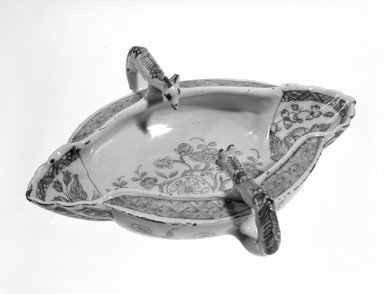  <em>Sauceboat</em>, ca.1755-1765. Earthenware, tin glazed, 2 1/2 x 8 5/8 x 7 3/4 in. (6.4 x 21.9 x 19.7 cm). Brooklyn Museum, Purchased with funds given by an anonymous donor, 75.111.2. Creative Commons-BY (Photo: Brooklyn Museum, 75.111.2_bw.jpg)
