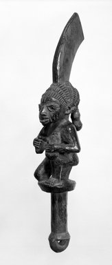 Yorùbá. <em>Dance Wand (Ogo Elegba)</em>, late 19th or early 20th century. Wood, pigment, 14 in.  (35.6 cm) tall. Brooklyn Museum, Gift of Dr. and Mrs. Abbott A. Lippman, 75.149.6. Creative Commons-BY (Photo: Brooklyn Museum, 75.149.6_bw.jpg)