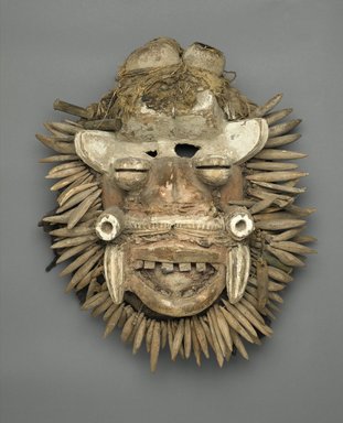 We. <em>Mask (Von Gla)</em>, late 19th or early 20th century. Wood, metal, fur, fiber, hair, leopard’s teeth, pigment, 18 x 15 3/4 x 6 in. (45.7 x 40 x 15.2 cm). Brooklyn Museum, Gift of Mr. and Mrs. J. Gordon Douglas III, 75.189.4. Creative Commons-BY (Photo: Brooklyn Museum, 75.189.4_PS1.jpg)