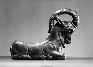  <em>Recumbent Ibex</em>. Limestone, 13 7/16 x 5 1/4 x overall length 17 13/16 in. (34.2 x 13.4 x 45.3 cm). Brooklyn Museum, Anonymous gift, 75.53. Creative Commons-BY (Photo: Brooklyn Museum, 75.53_rightside_bw.jpg)