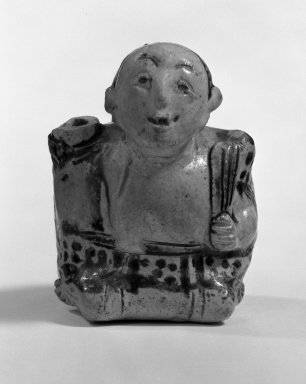  <em>Sawankhalok Sgraffiato Figure of a Hunchback</em>, 15th–16th century. Porcellaneous stoneware, 3 1/8 x 2 3/8 x 2 1/4 in. (8 x 6 x 5.7 cm). Brooklyn Museum, Designated Purchase Fund, 75.60.1. Creative Commons-BY (Photo: Brooklyn Museum, 75.60.1_bw.jpg)
